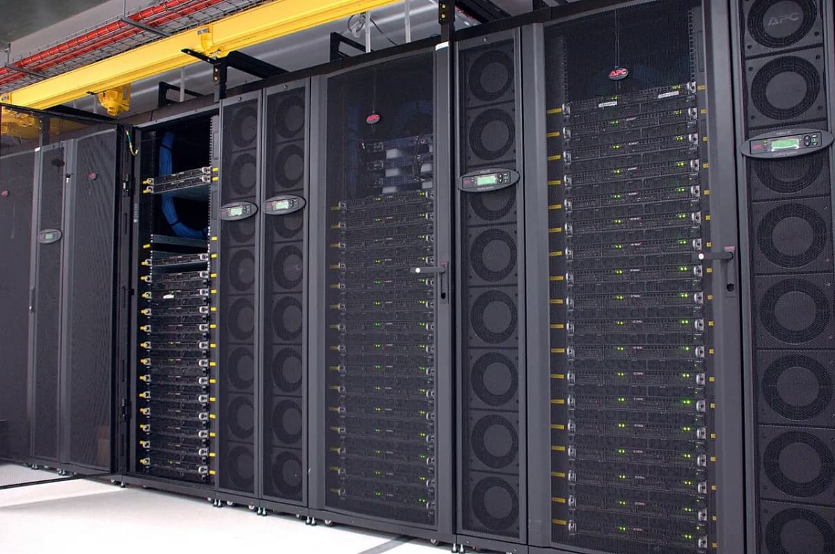 Racks of GPU servers in a data center cluster, the kind of hardware that runs open-source LLMs such as GLM, Kimi, DeepSeek and Qwen. Photo: CSIRO, Wikimedia Commons, CC BY 3.0