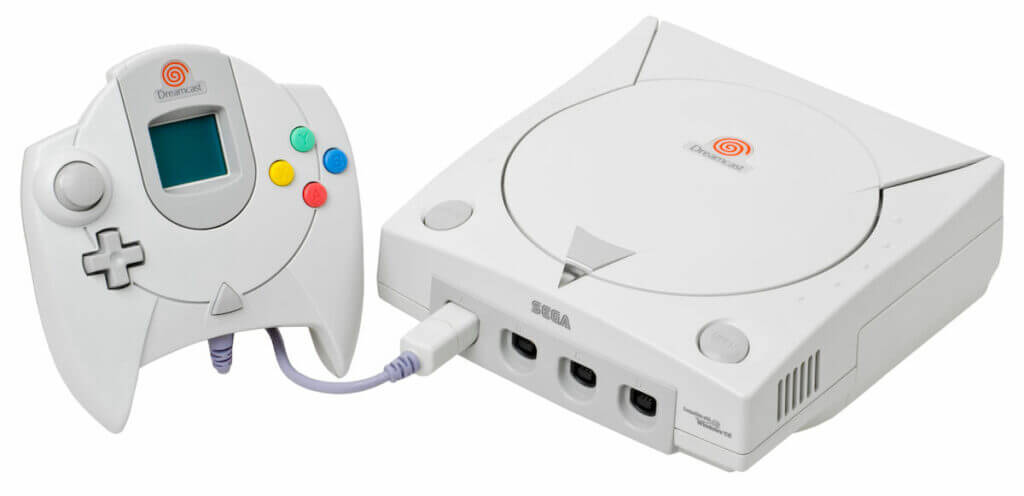 Sega Dreamcast with a controller.