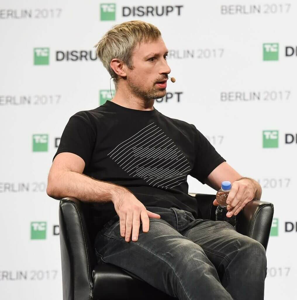 Gavin Wood sitting in a chair at TechCrunch Disrupt Berlin (2017).