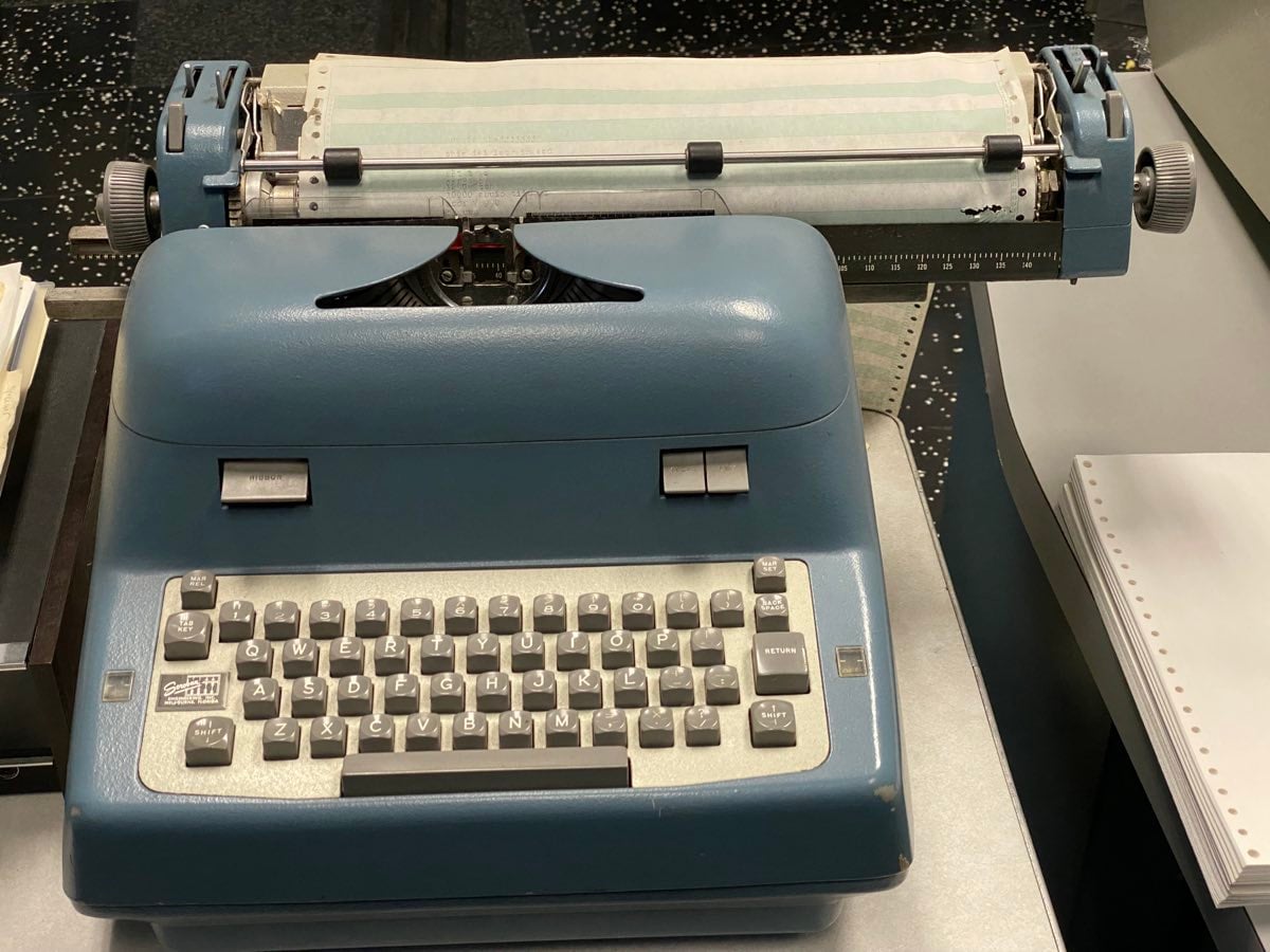 History of the agent harness: the PDP-1 console typewriter, where the first read-eval-print loop ran in 1964