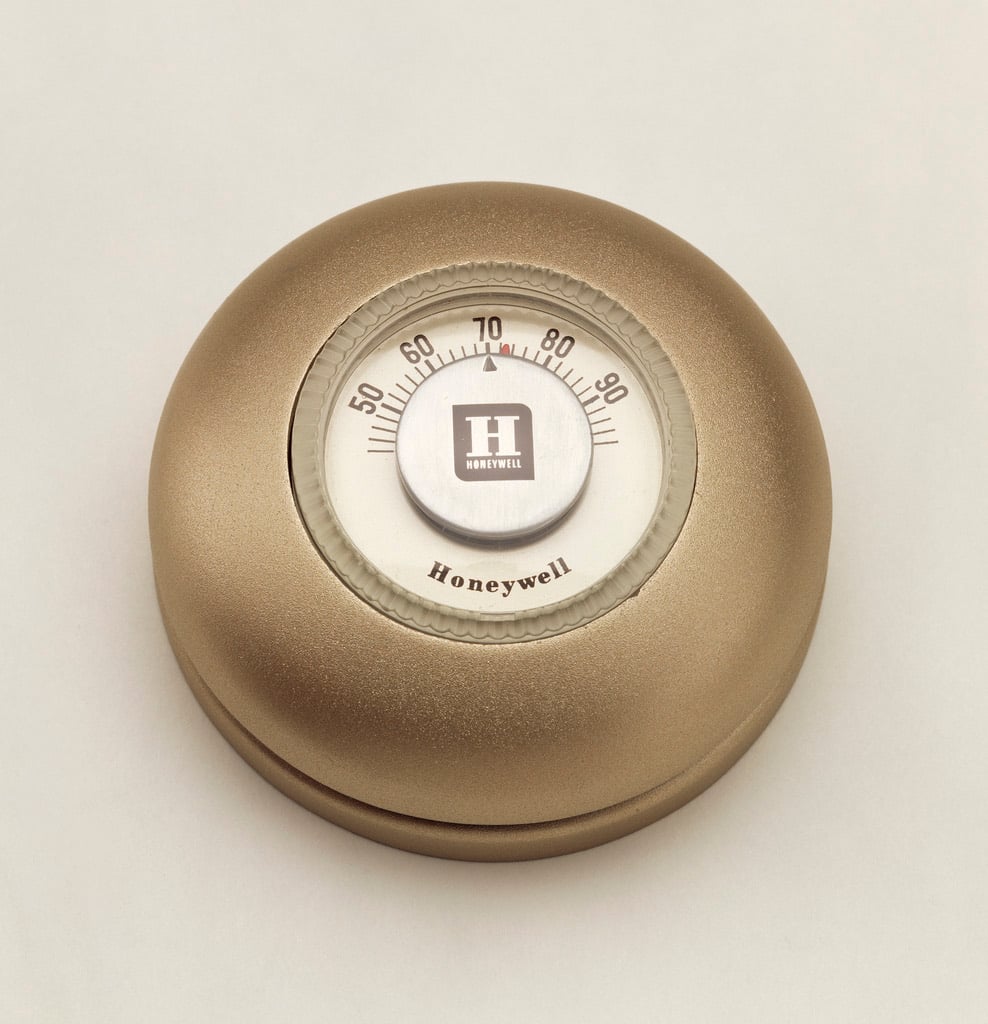 A 1953 Honeywell T-86 Round thermostat.